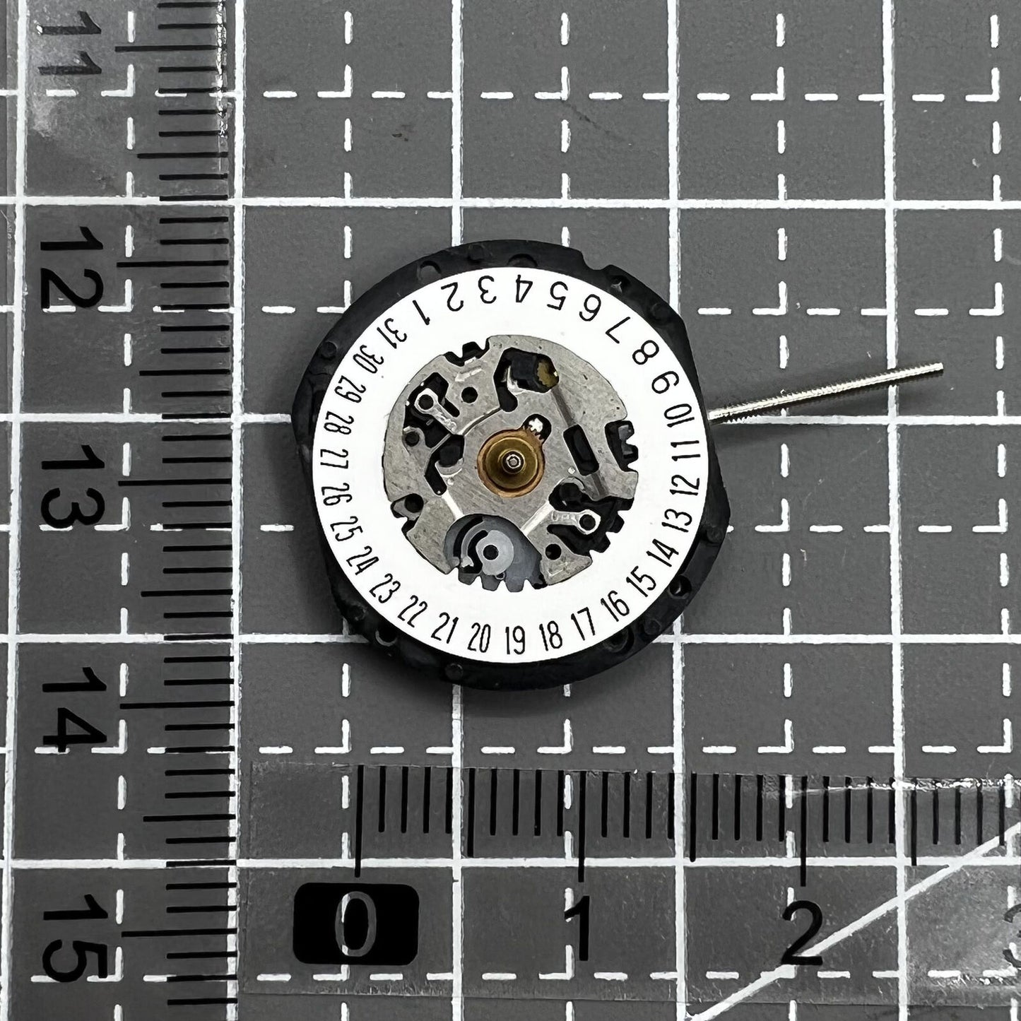 Hattori Epson VX19E quartz movement with date display at 6 o'clock for watch accessories.