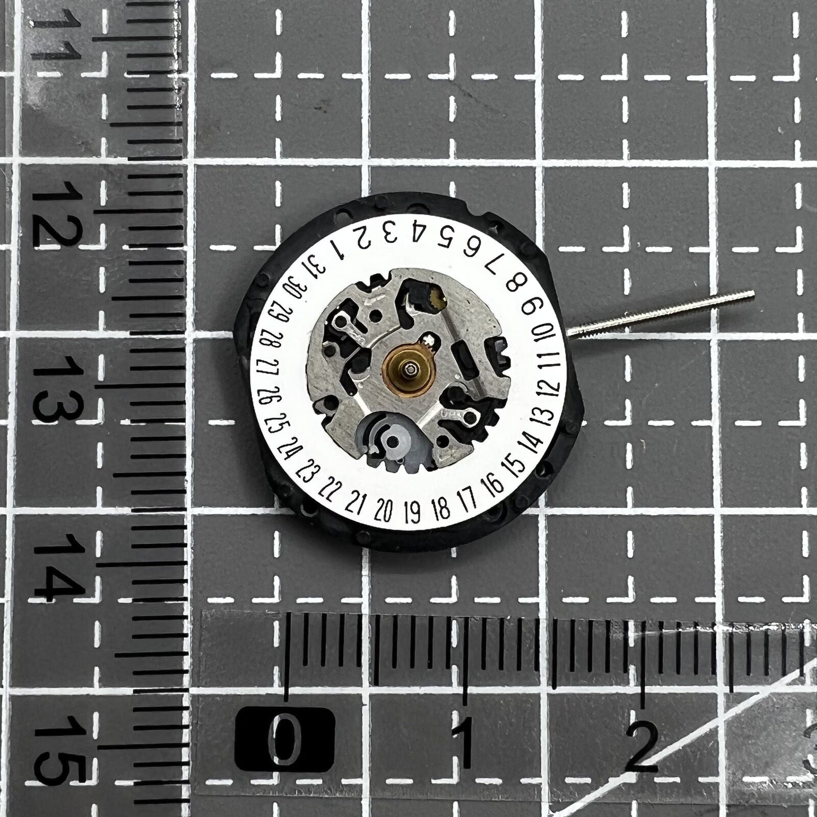 Hattori Epson VX19E quartz movement with date display at 6 o'clock for watch accessories.