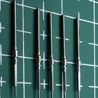 Wholesale lot of ST2555 watch winding stems, Chinese brand spare parts ideal for repairs and replacements.