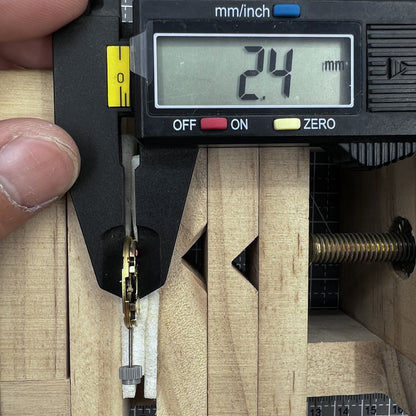 Swiss ETA F04.115 quartz watch movement with 3 hands and date display at 3 o'clock for precision timing.