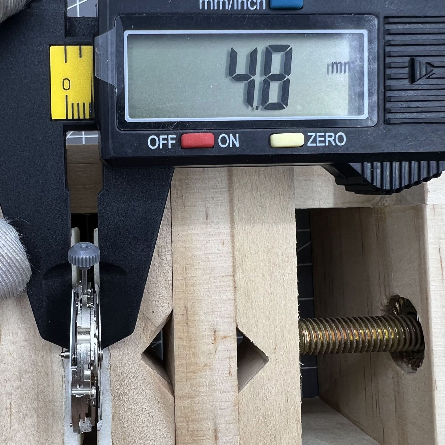 Miyota 8217 automatic watch movement displaying three hands with a small seconds subdial at 9 o'clock.