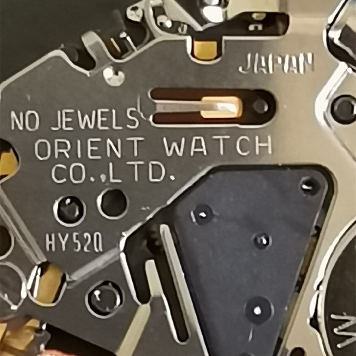 Orient HY520 quartz watch movement displaying three hands, no jewels or calendar, designed for accurate timekeeping.