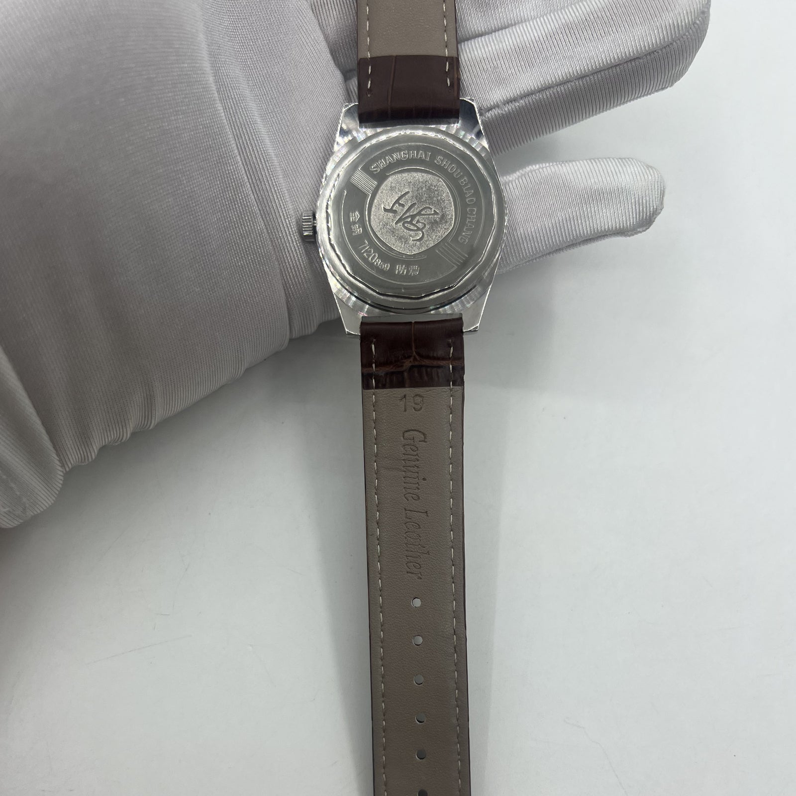 Shanghai Factory 38mm manual mechanical watch with white dial, 3 hands, 19 jewels for precise timekeeping.