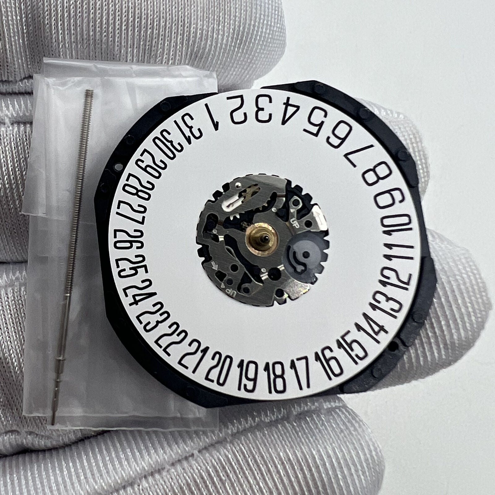 Japan-made Hattori Epson TMI VX62 quartz watch movement for precise timekeeping and durability.