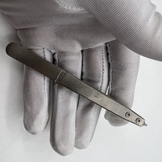 Precision Bergeon 7825 spring bar tweezer for watch lug removal and fitting accessories.