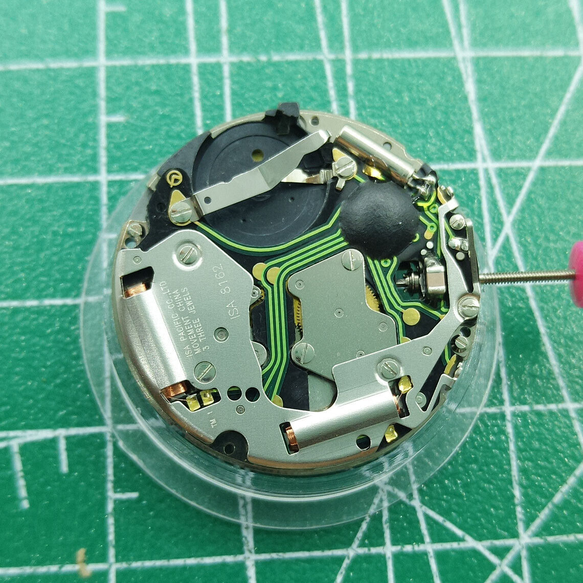 ISA 8162 quartz watch movement with date at 4, reliable replacement for precise timekeeping.