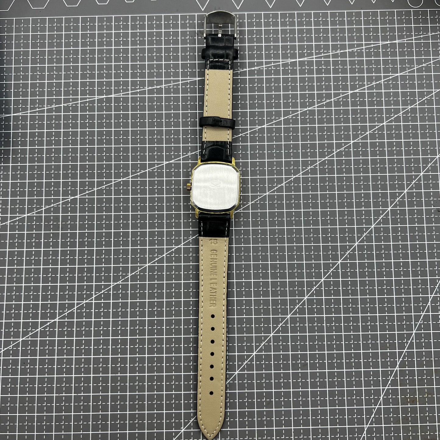 28mm Tianjin Seagull watch with octagonal gold case, golden dial, manual mechanical movement, elegant design.