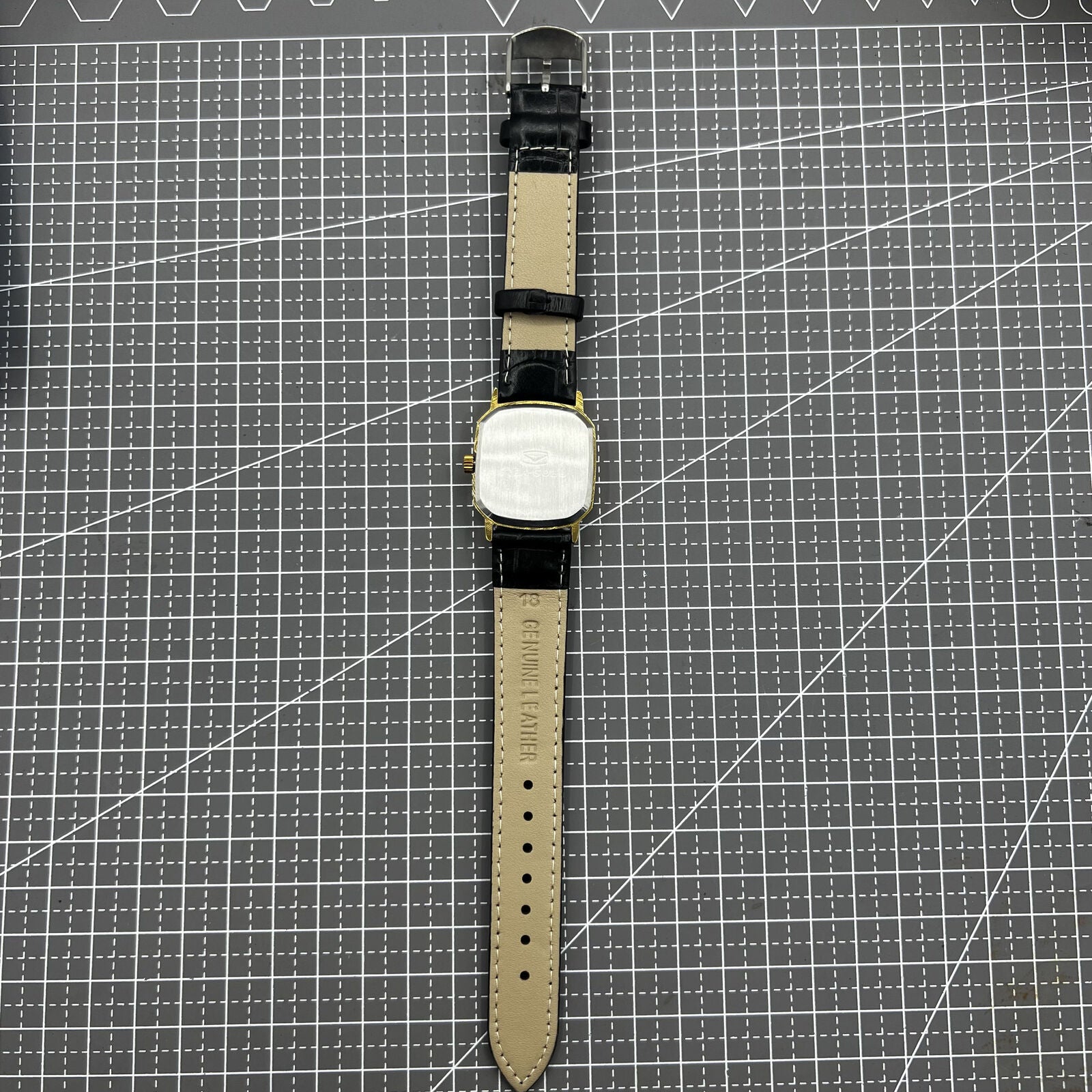 28mm Tianjin Seagull watch with octagonal gold case, golden dial, manual mechanical movement, elegant design.