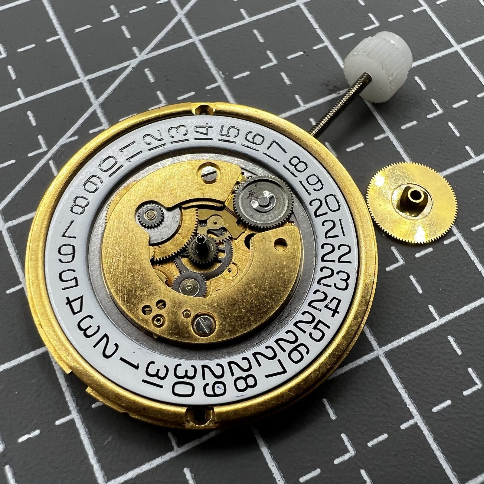 ETA255.461 Swiss Made quartz watch movement with 3 hands, date at 4 o'clock, perfect for accurate watch repairs.