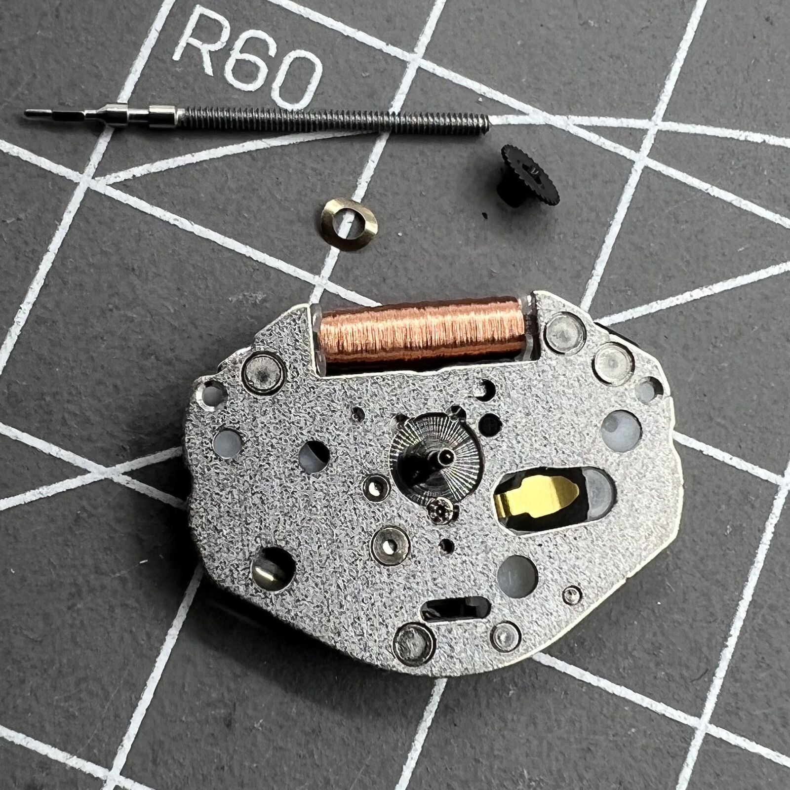 Miyota 2036 quartz movement with 3 hands and high pinion, including watch stem for precise timekeeping.
