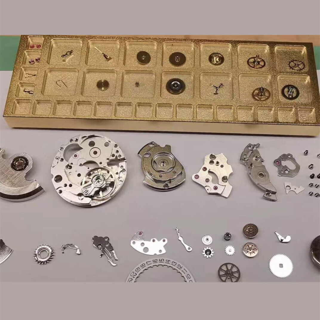 Compact 33-grid square copper golden storage tray for organizing screws in watch repair kits.