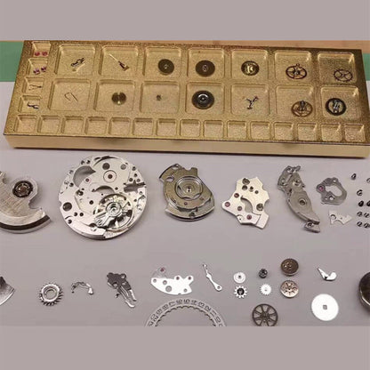 Compact 33-grid square copper golden storage tray for organizing screws in watch repair kits.