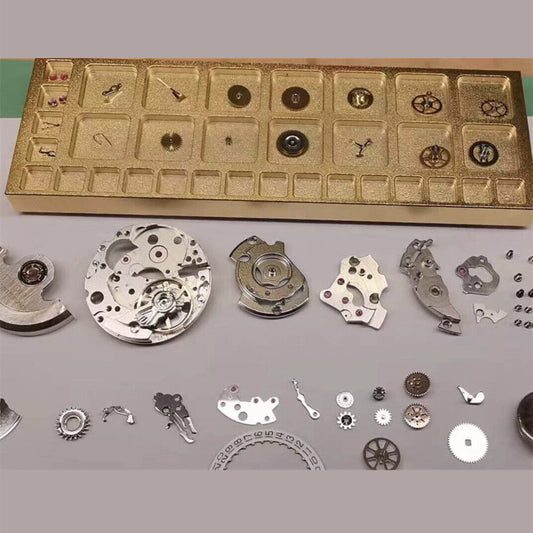 Compact 33-grid square copper golden storage tray for organizing screws in watch repair kits.