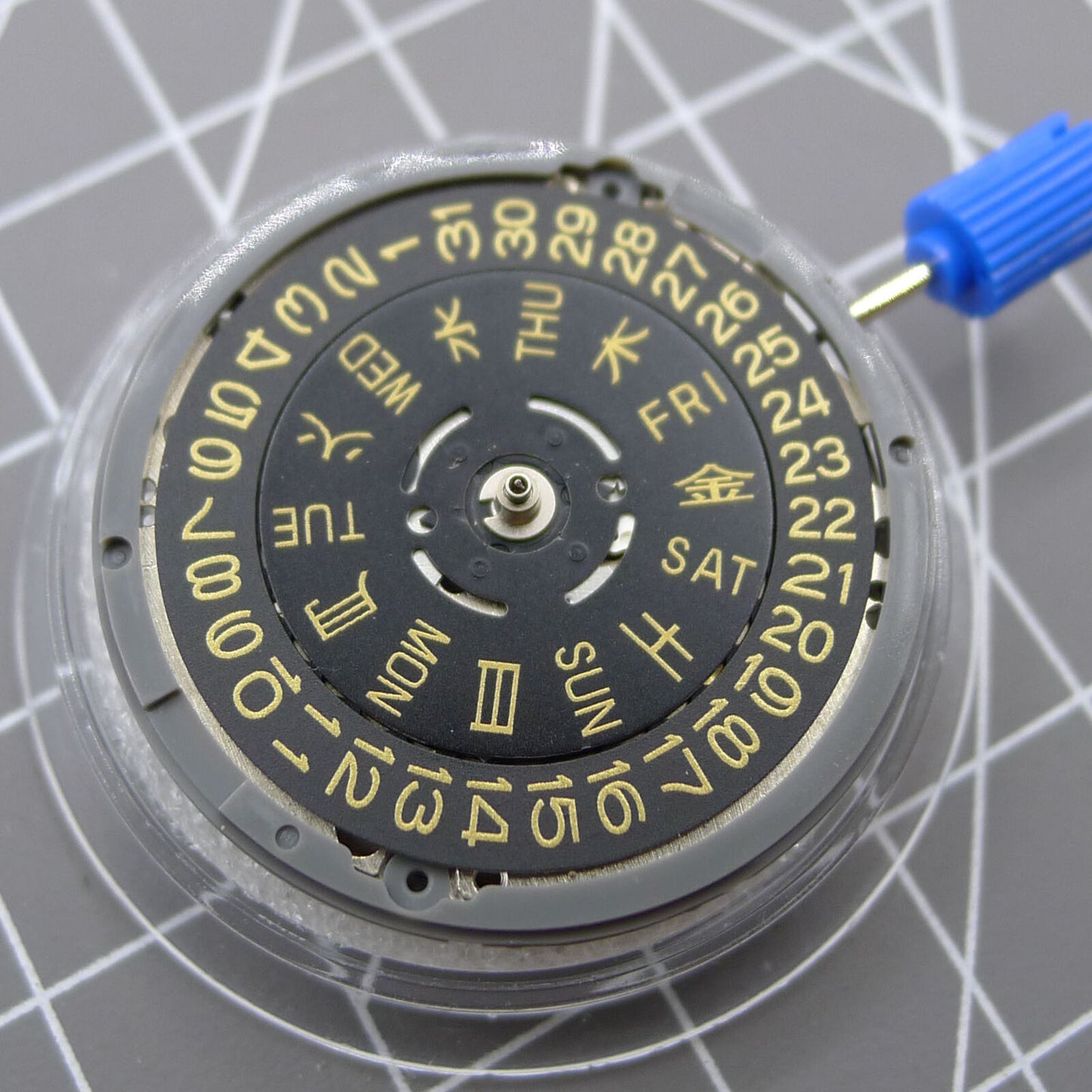 NH36 automatic watch crown at 3.0/3.8 position with black dial and golden font by Seiko.