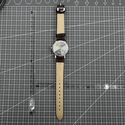 Shanghai 33mm manual mechanical watch with 17 jewels, single calendar, and shock-resistant design for precise timekeeping.