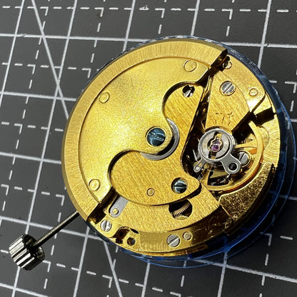 Polished gold Tianjin T16 mechanical watch movement, compatible with Miyota 8200, precision replacement part.