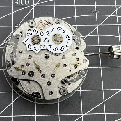 Tianjin Seagull ST25 automatic watch movement with large date and three hands, made in China.