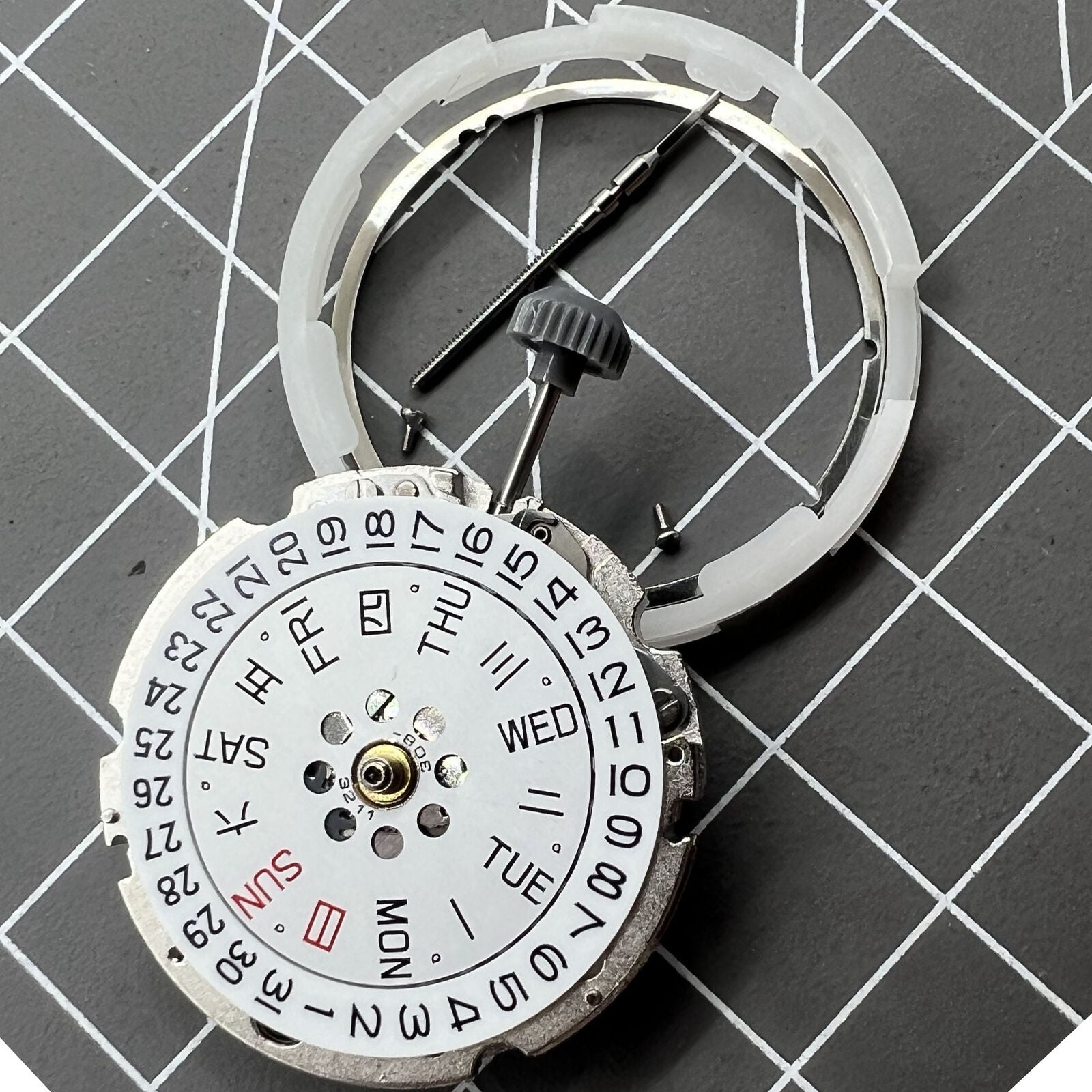 Miyota/Citizen 8200 automatic watch movement with double calendar feature, precision mechanical mechanism.