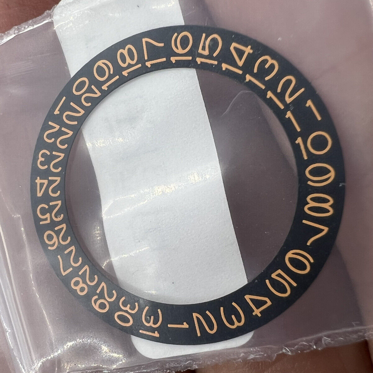 Orange date disk with character markings for NH35 NH36 watch movement, black background, Seiko-compatible accessory.