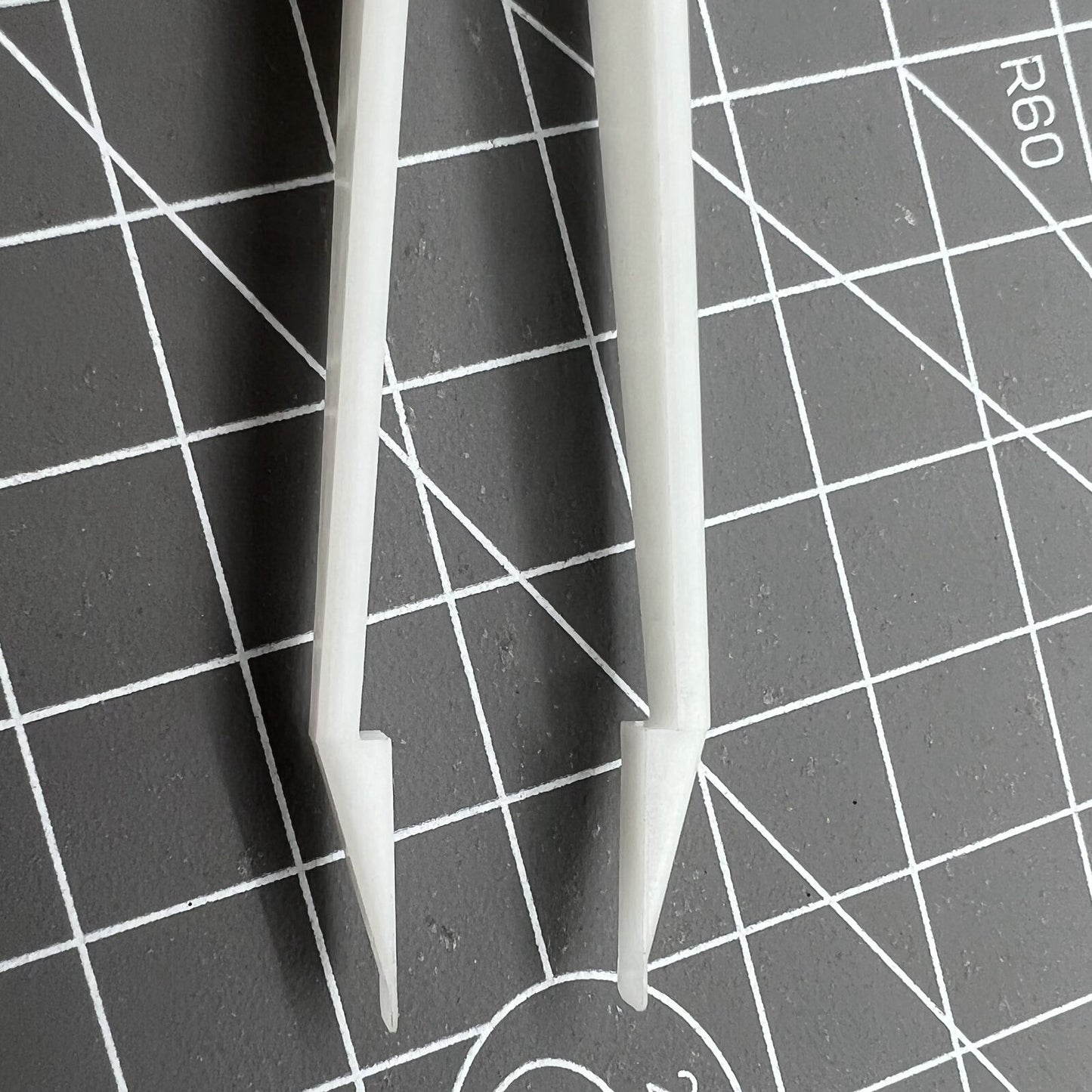 Bergeon 6460 Swiss Made plastic battery tweezer for precise watch battery handling and replacement tool.