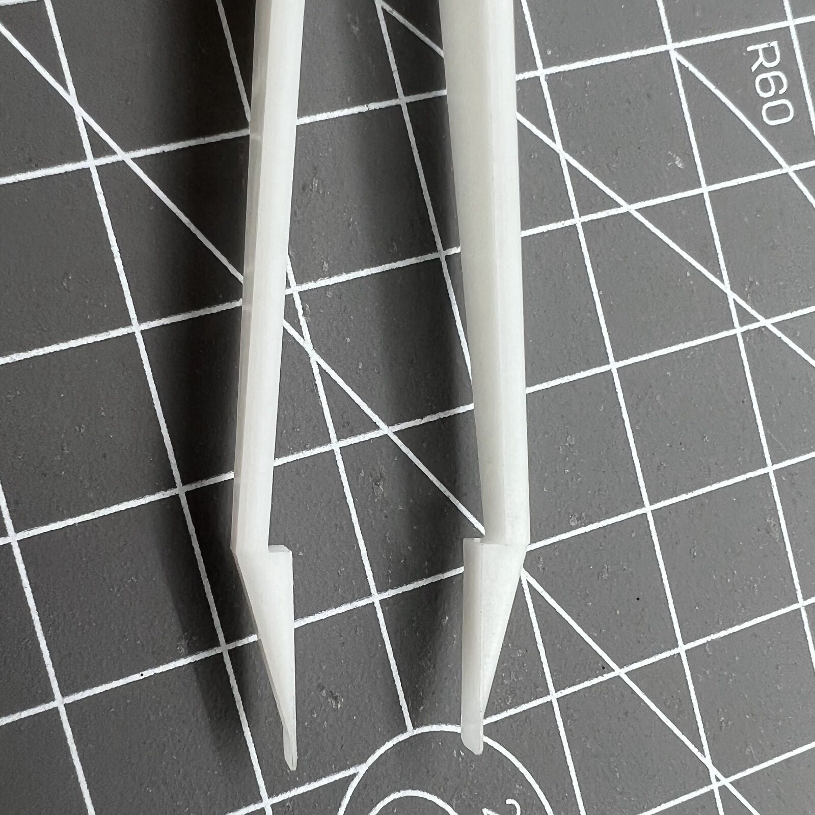 Bergeon 6460 Swiss Made plastic battery tweezer for precise watch battery handling and replacement tool.