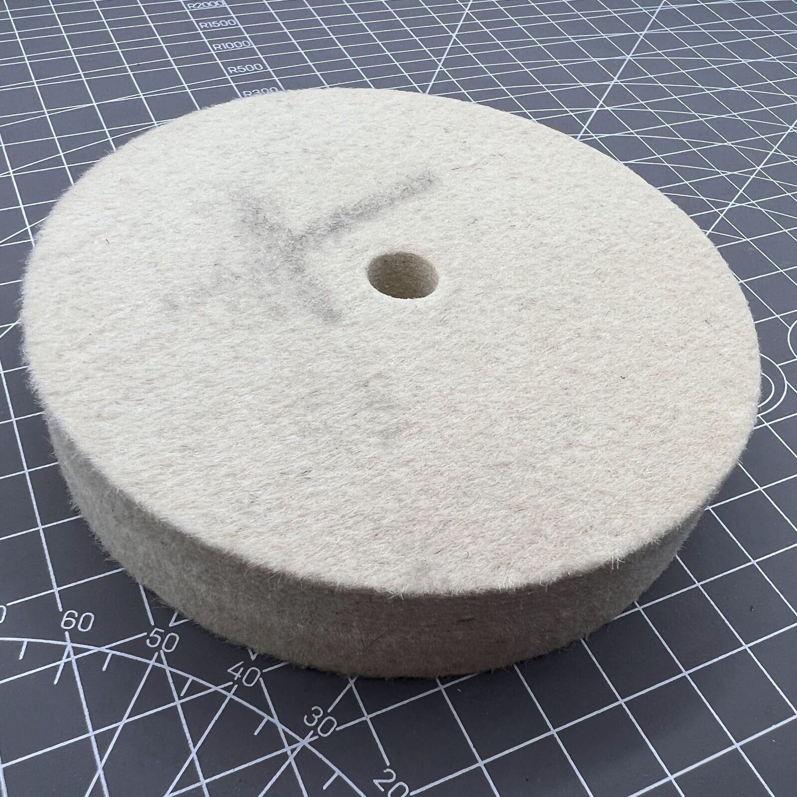 Swiss Bergeon 1207 white felt polishing wheel for watch accessories, precision Swiss craftsmanship.