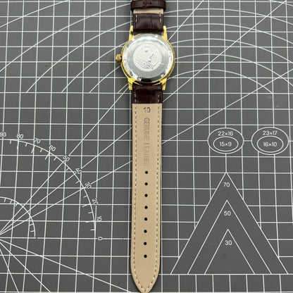 Beijing Double Rhomb manual watch with golden case, silver nail markers, classic style for elegant wear