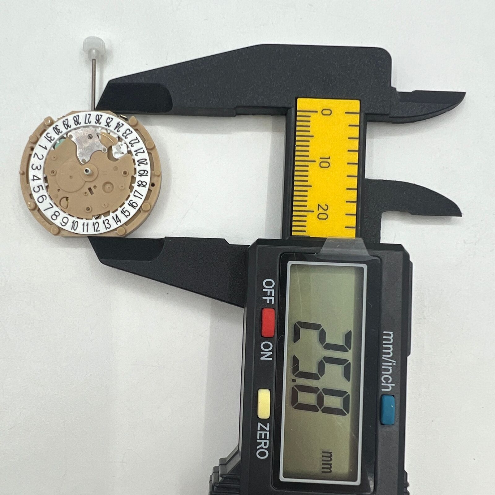 Sunon PE60 quartz watch movement with date display at 6, three hands for accurate timekeeping.