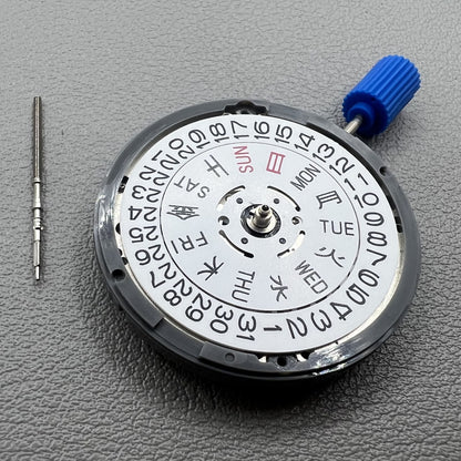 Seiki NH36 watch movement with white dial, featuring Japanese-English day display for precision timekeeping.