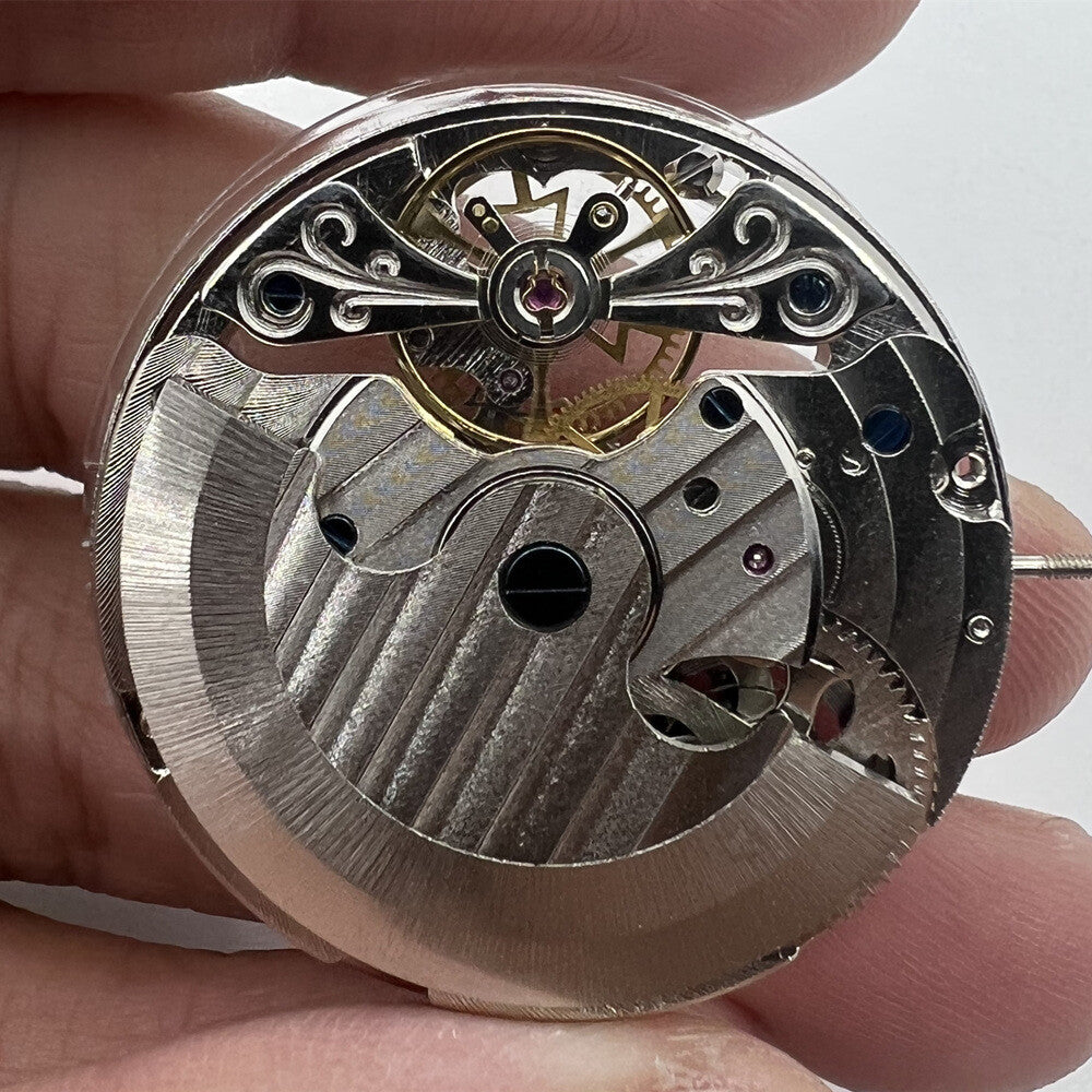 Double Mainspring mechanical watch with hollow dial, showcasing dual time zones and intricate gears.