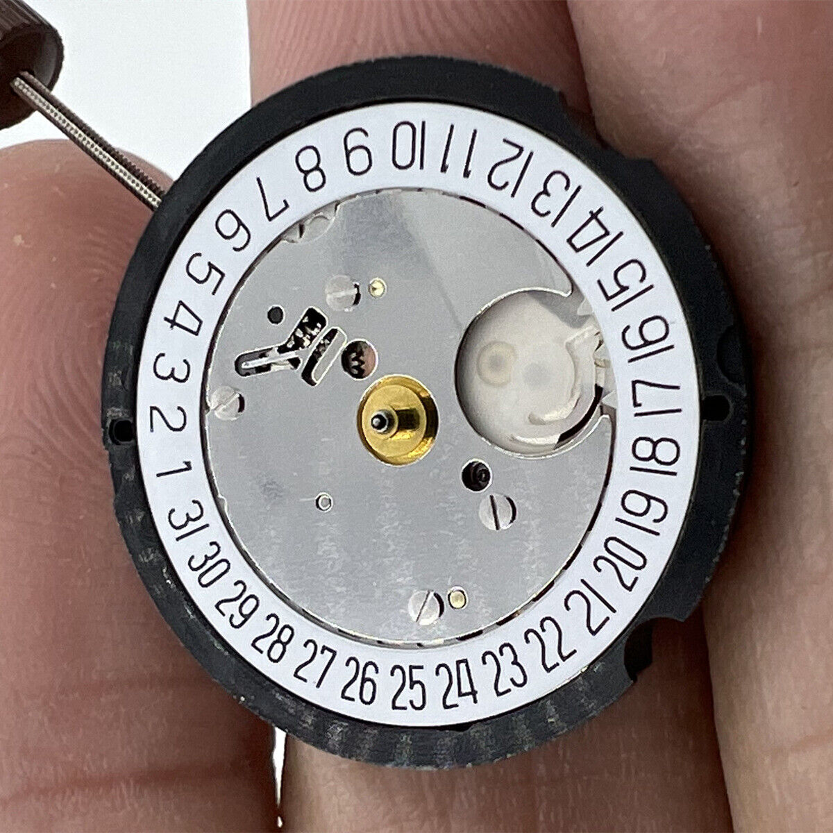 Ronda 505 Swiss quartz watch movement with date display at 6 o'clock, precise timekeeping.