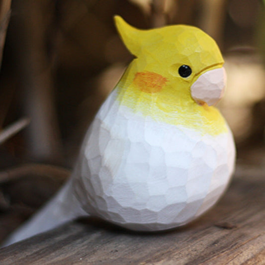 Handmade white phoenix parrot wooden figurine, elegant decorative accent for home or office.