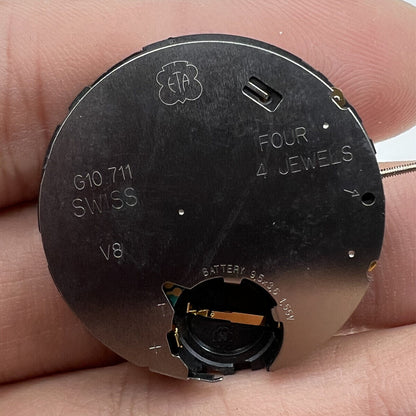 ETA G10.711 Swiss quartz watch movement featuring three hands and date for accurate timekeeping.