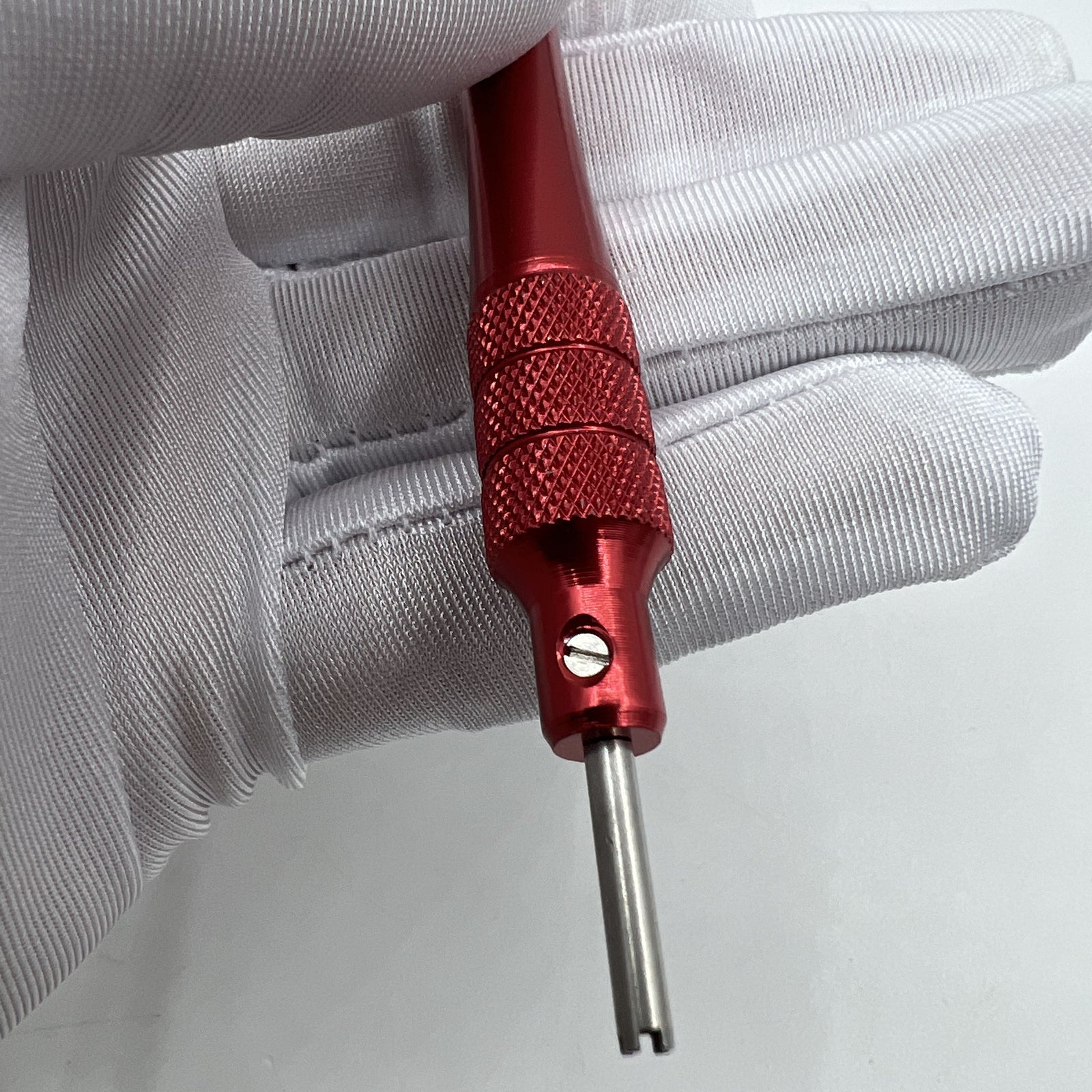 Close-up of 2.75mm RM screwdriver blade by RICHARD MILLE for precise strap, bezel, and case back screw adjustments