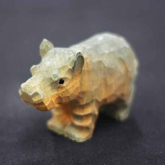 Handmade little hippo wooden sculpture, charming decorative artwork for home decor.