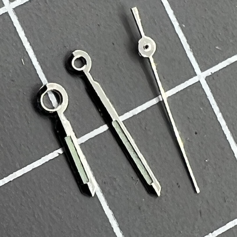 Luminous watch hands set for Miyota 2115 movement, 14/11/8mm lengths, improving night readability.