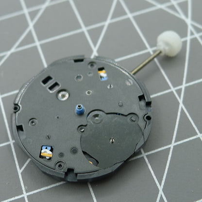 Sunon PE80 quartz watch movement showing three hands with small seconds at 3, 6, and 9 positions.