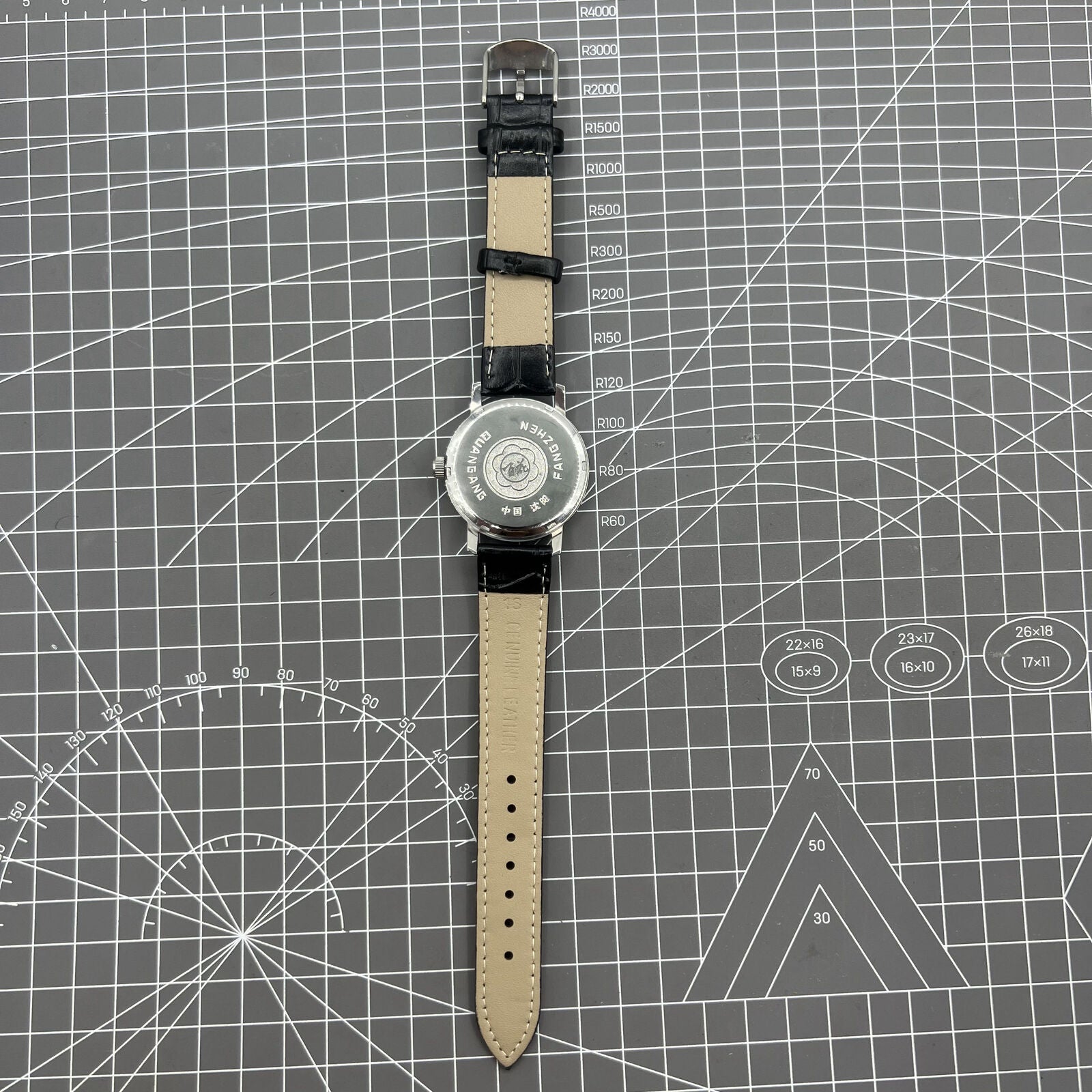 Baihua 37mm manual mechanical watch with silver dial, 19 jewels, and shock-resistant durability.