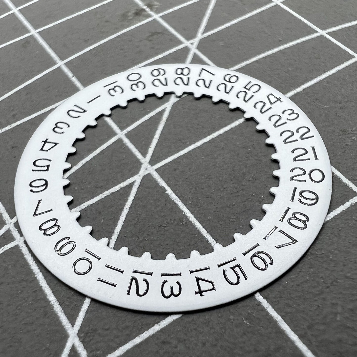 White date wheel for RLX 3135 watch movement, compatible replacement part for accurate date display.