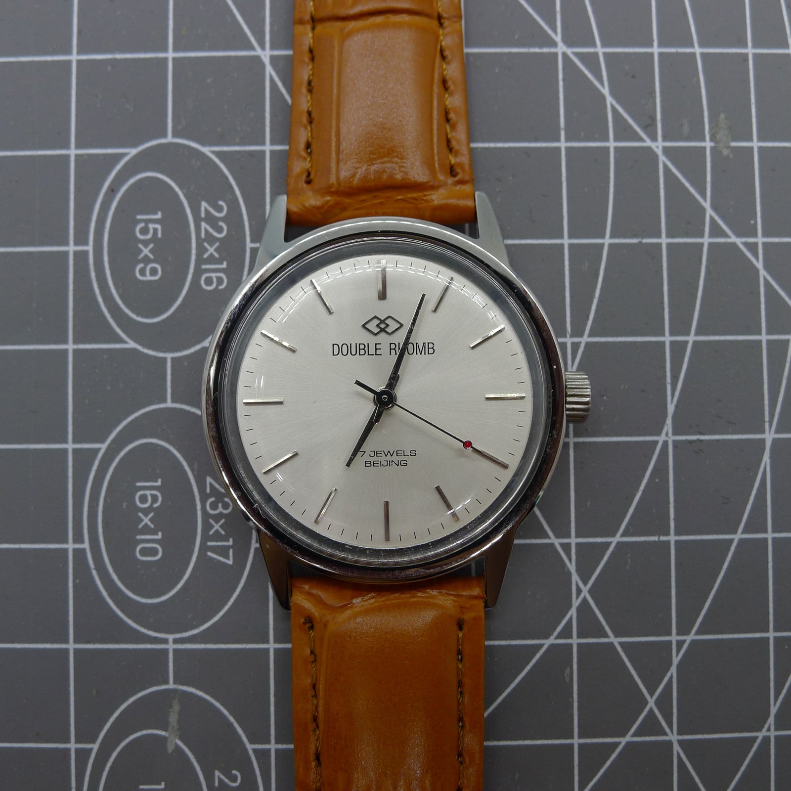 Beijing 36mm Double Rhomb watch with silver case, nail markers, manual mechanical movement for precision timekeeping