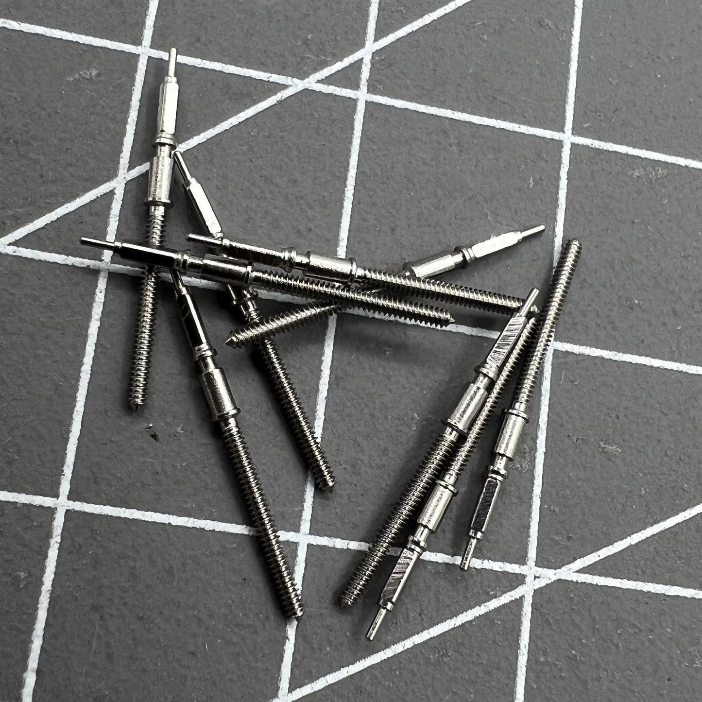 Precision watch winding stem for SW200 movement, ensuring smooth time adjustments.