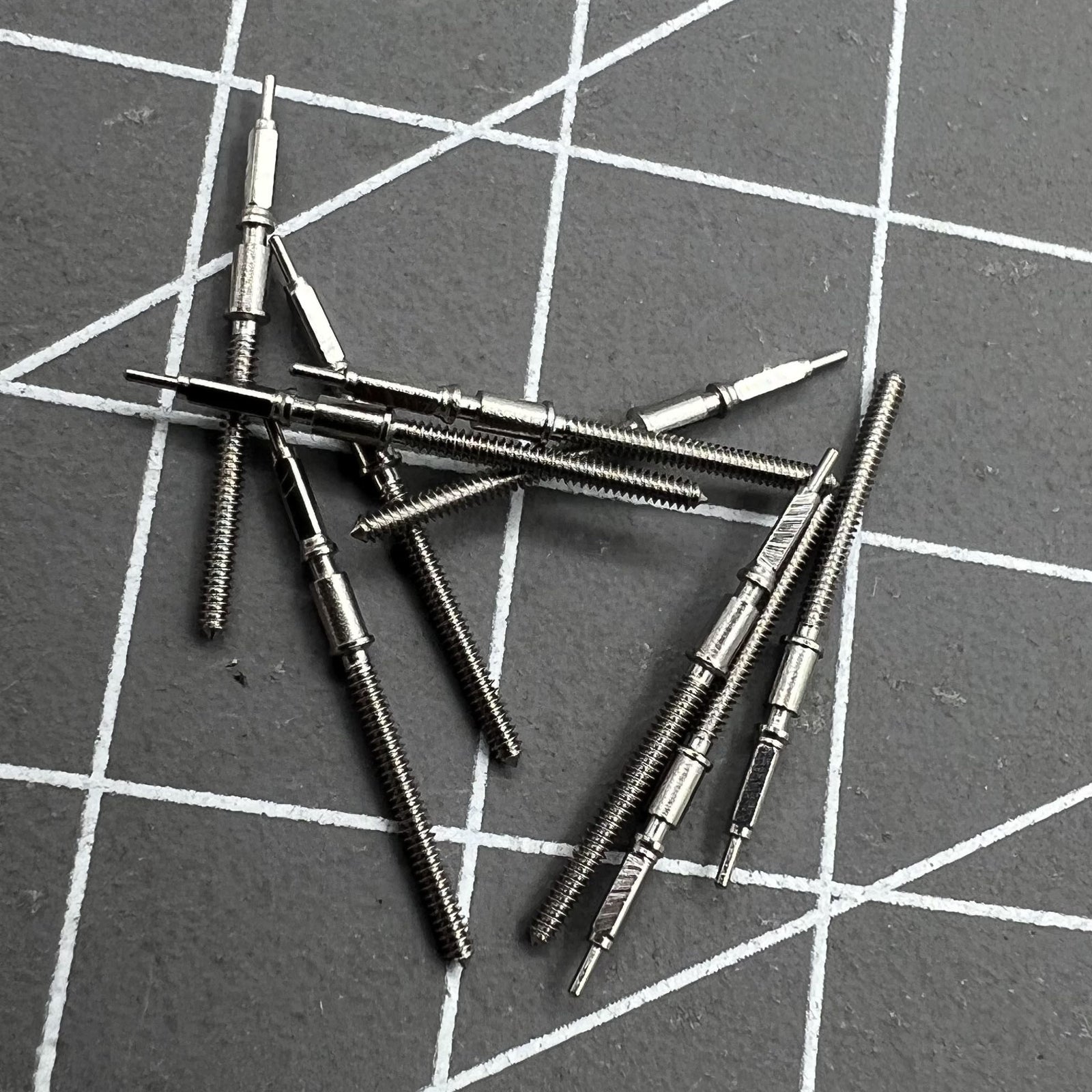 Precision watch winding stem for SW200 movement, ensuring smooth time adjustments.