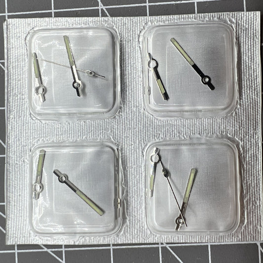 Golden and silver luminous watch hands for movement 7009 by Generic, enhancing time visibility in low light.