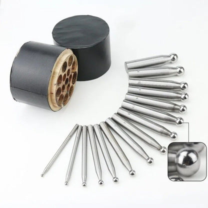 Shaping dapping punch set with wooden stand, ideal for jewelers and metalsmiths crafting detailed designs.