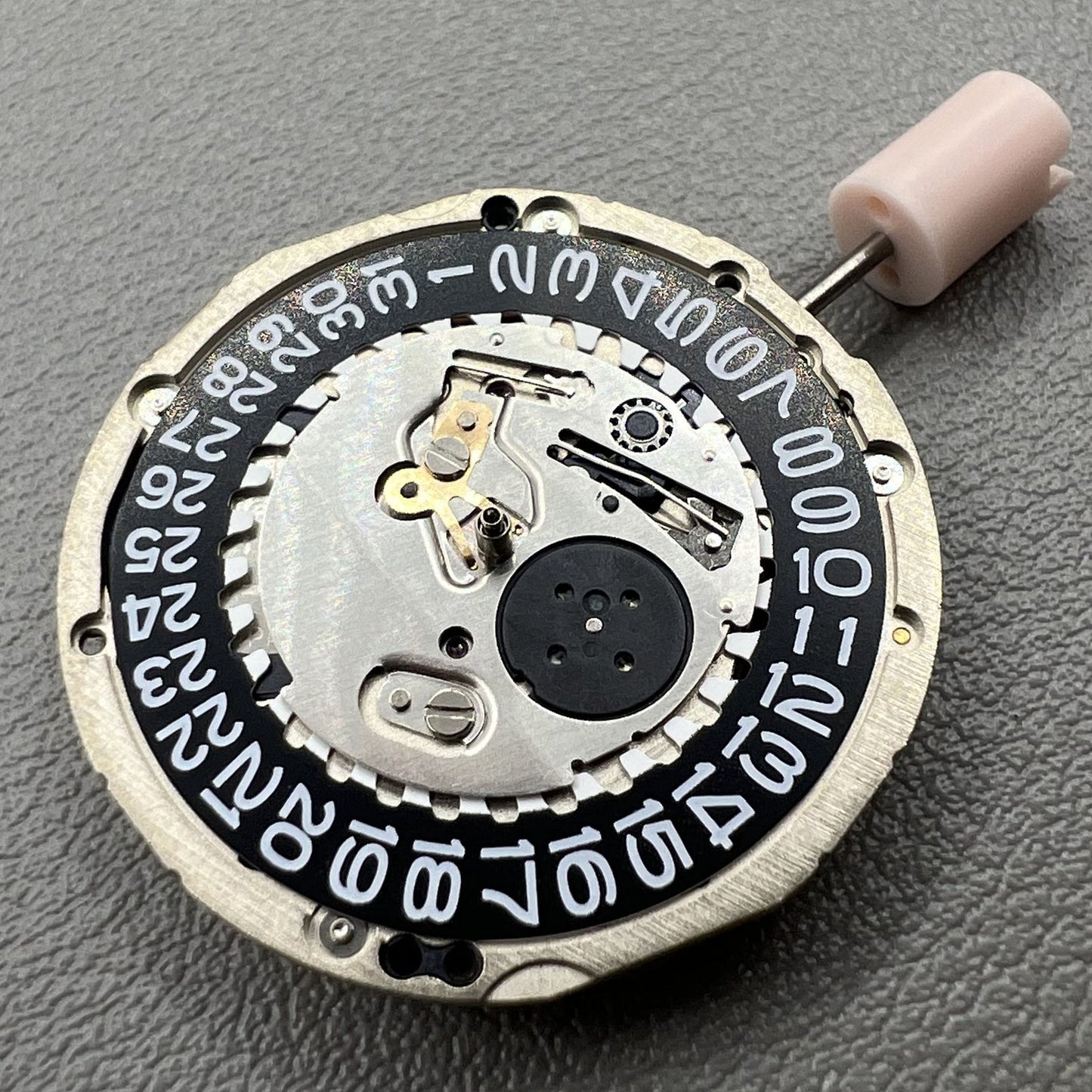 Seiko 5J32A quartz watch movement with black dial and single calendar display for precise timekeeping