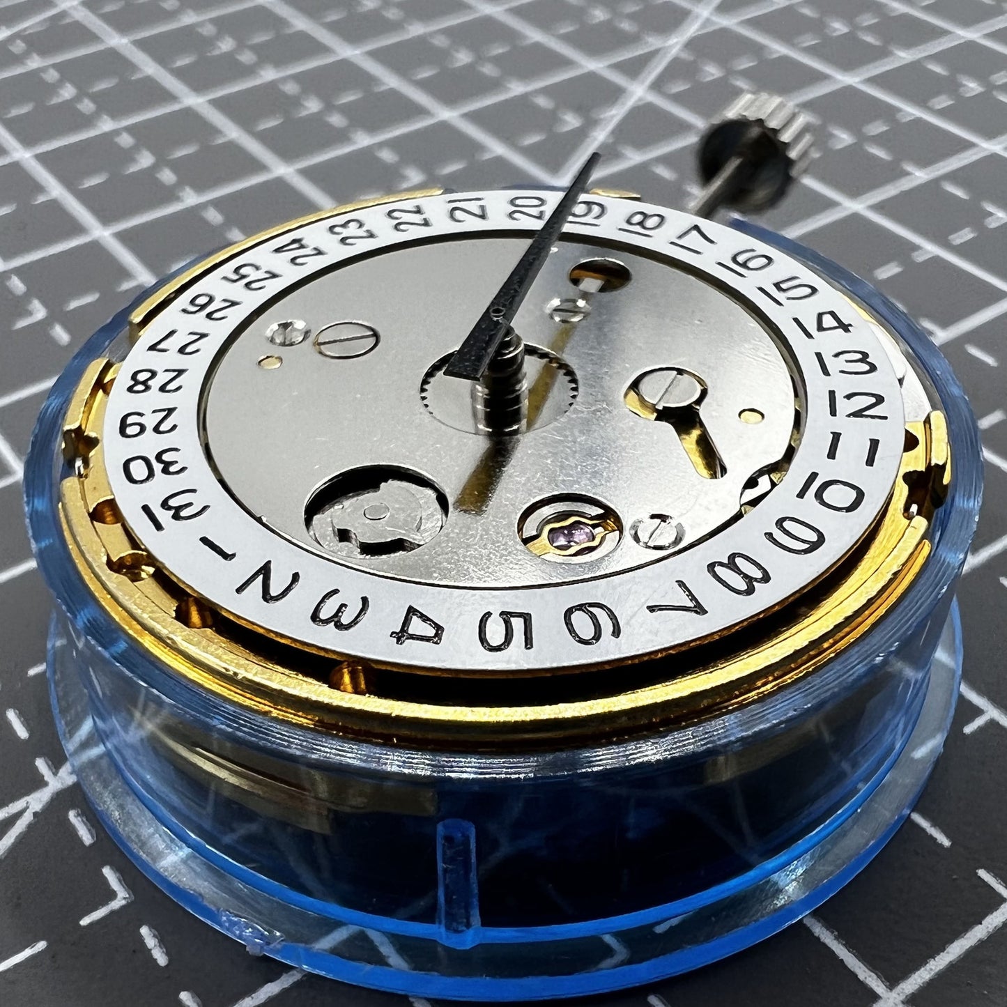 Polished gold Tianjin T16 mechanical watch movement, compatible with Miyota 8200, precision replacement part.