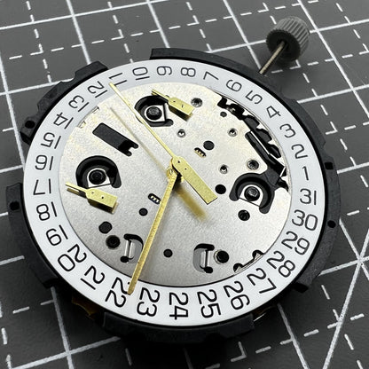 ETA G10.212 quartz watch movement showing three hands and date display by ETA brand.