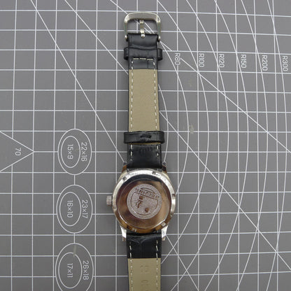 Silver 31mm Beijing Double Rhomb manual mechanical watch with three hands, sleek design by Beijing brand.