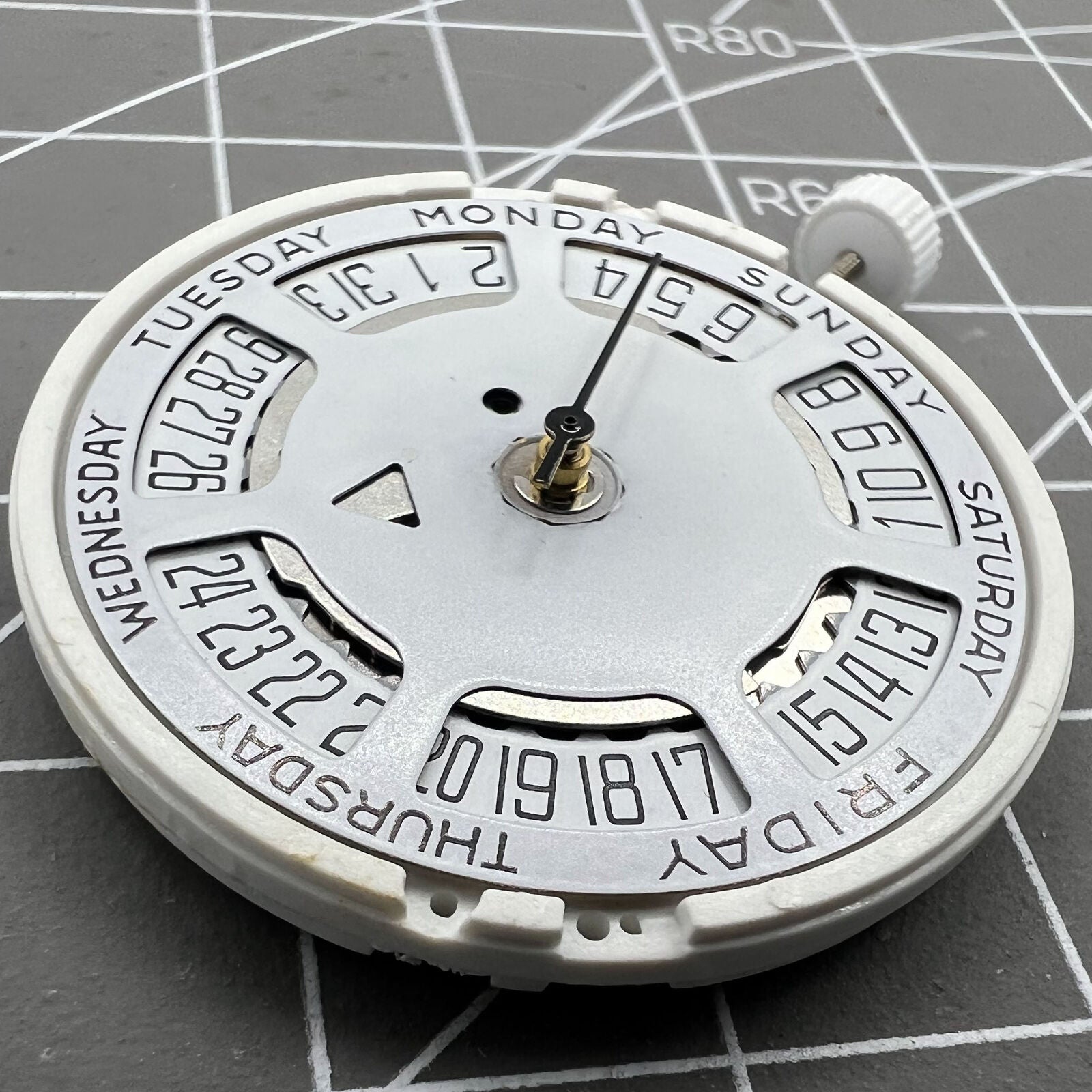 ISA 1198 quartz watch movement with day-date display, white dial, date at 6 o'clock, replacement part.