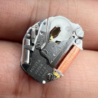 Miyota 2039 quartz movement with watch stem for precise, durable timekeeping by Miyota.